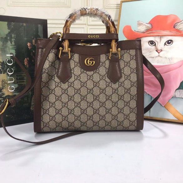 G*u*i shopping bags